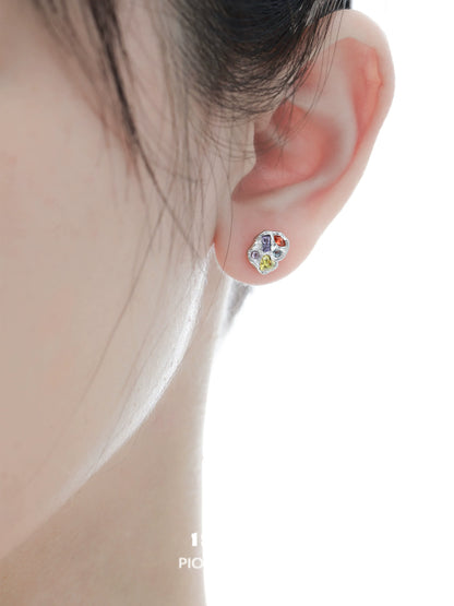 Dopamine earrings colorful studs worn on the ear, featuring vibrant designs and a unique style