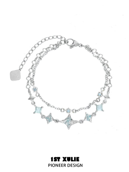 Elegant double layer starfish silver bracelet featuring sparkling star and gem accents