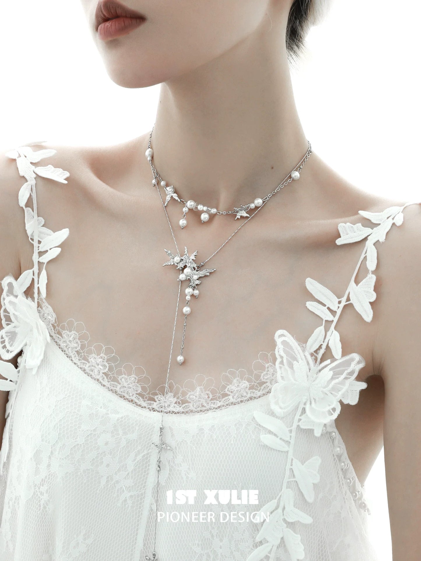 Elegant 1STXULIE dream wings pearl necklace featuring a butterfly design and delicate pearls