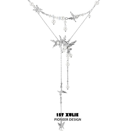 1STXULIE dream wings pearl necklace featuring silver star design and elegant pearl accents