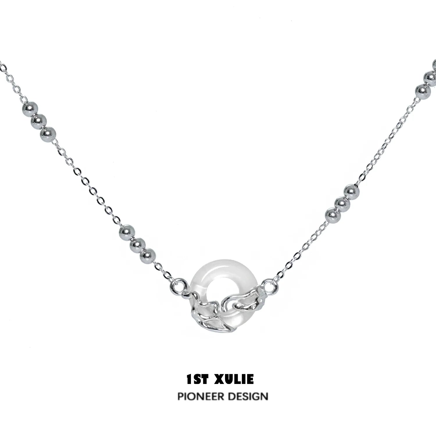 Eternal rings silver necklace from 1STXULIE with a modern design and elegant finish