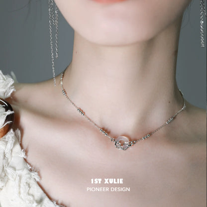 Elegant 1ST XULIE eternal rings silver necklace featuring modern design and charm