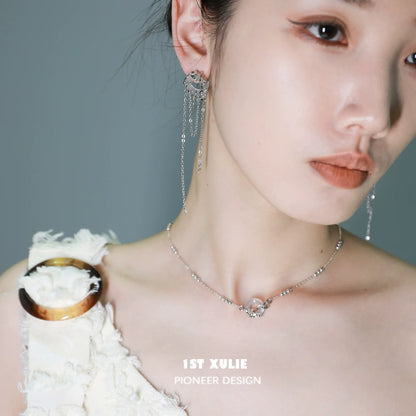 Model wearing an elegant eternal rings silver necklace with unique design for a modern look