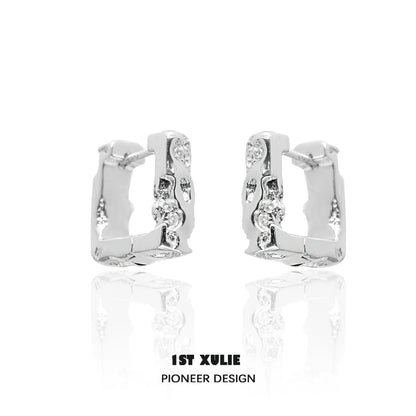Frosted geometric earrings designed by 1STXULIE with unique cut and modern finish.