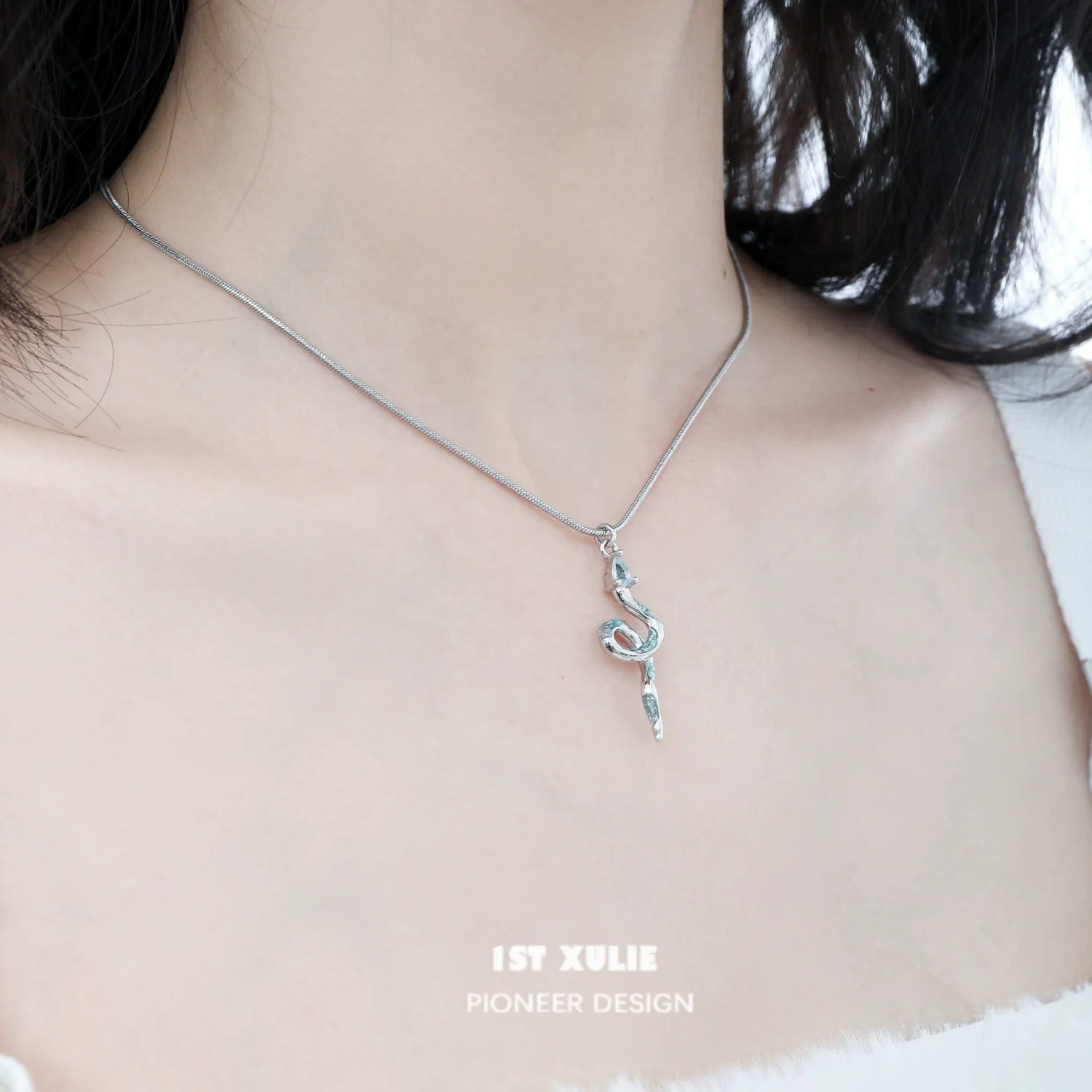 Frozen snake silver necklace featuring a unique serpent design on a delicate chain