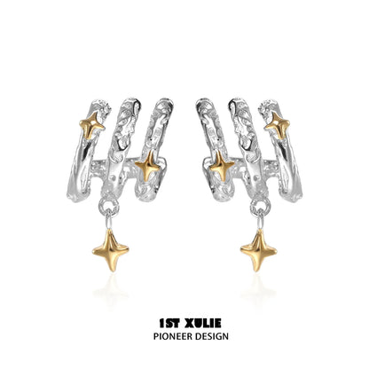 Stylish galactic star earrings in silver and gold for a unique celestial look