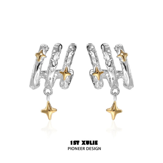 Stylish galactic star earrings in silver and gold for a unique celestial look