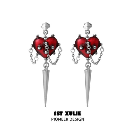 Gothic heart earrings featuring red hearts with chains and pointed silver drop accents