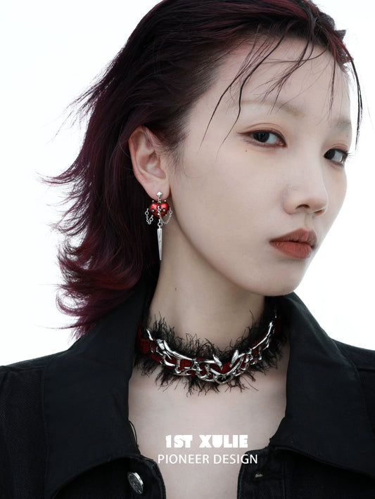 Gothic heart earrings by 1ST XULIE featuring a unique design and striking colors