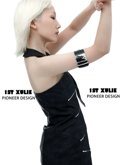 Gothic liquid metal arm bracelet worn by a model showcasing unique design and style