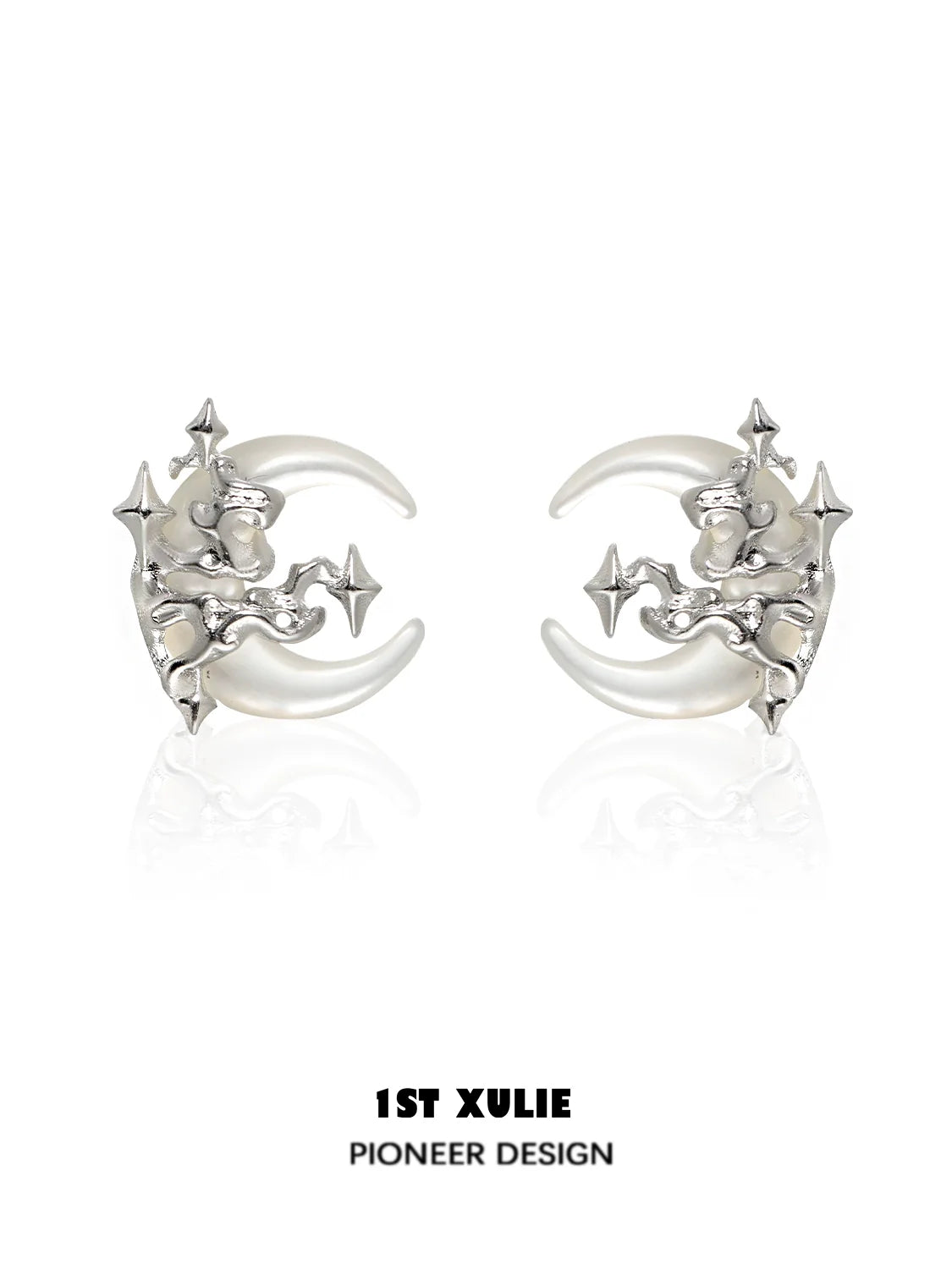 Silver gothic moon earrings featuring intricate designs and star accents for a unique look