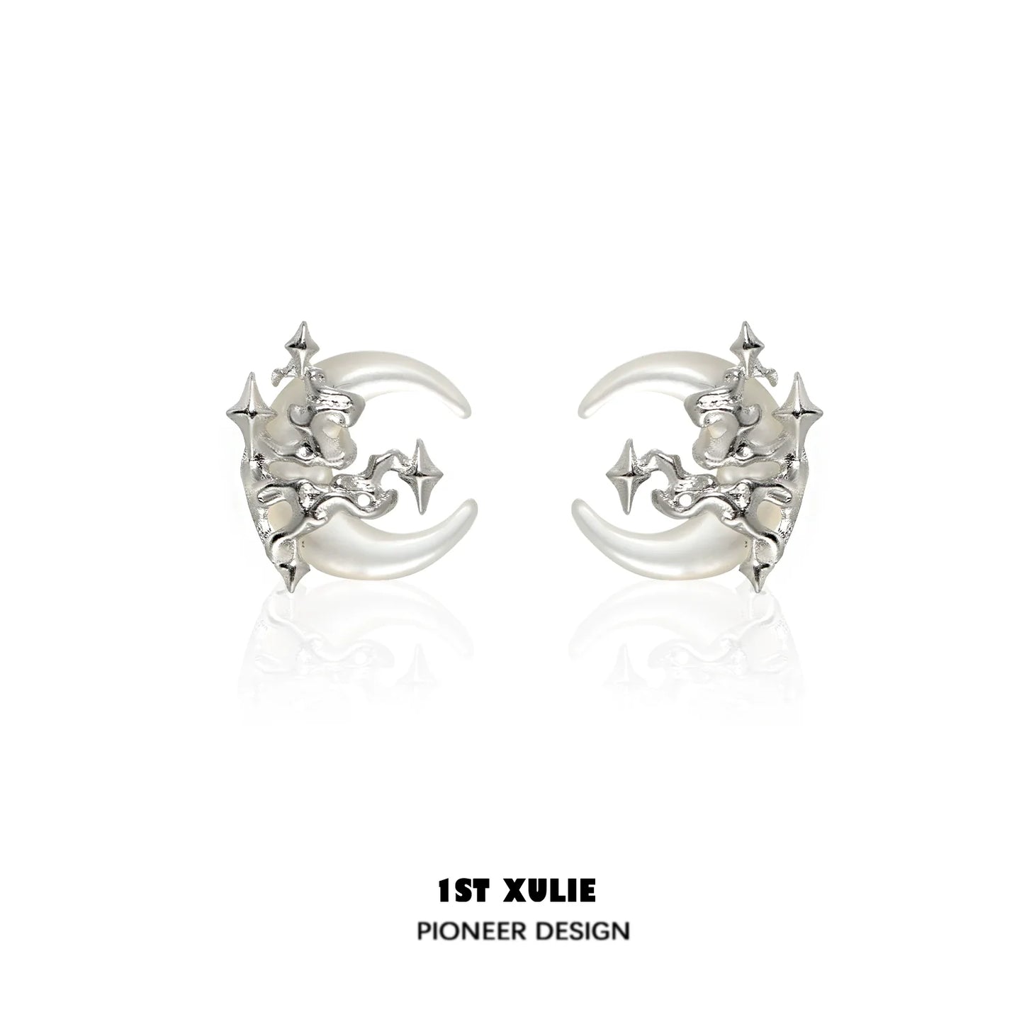 Silver gothic moon earrings featuring a unique celestial design with intricate star details