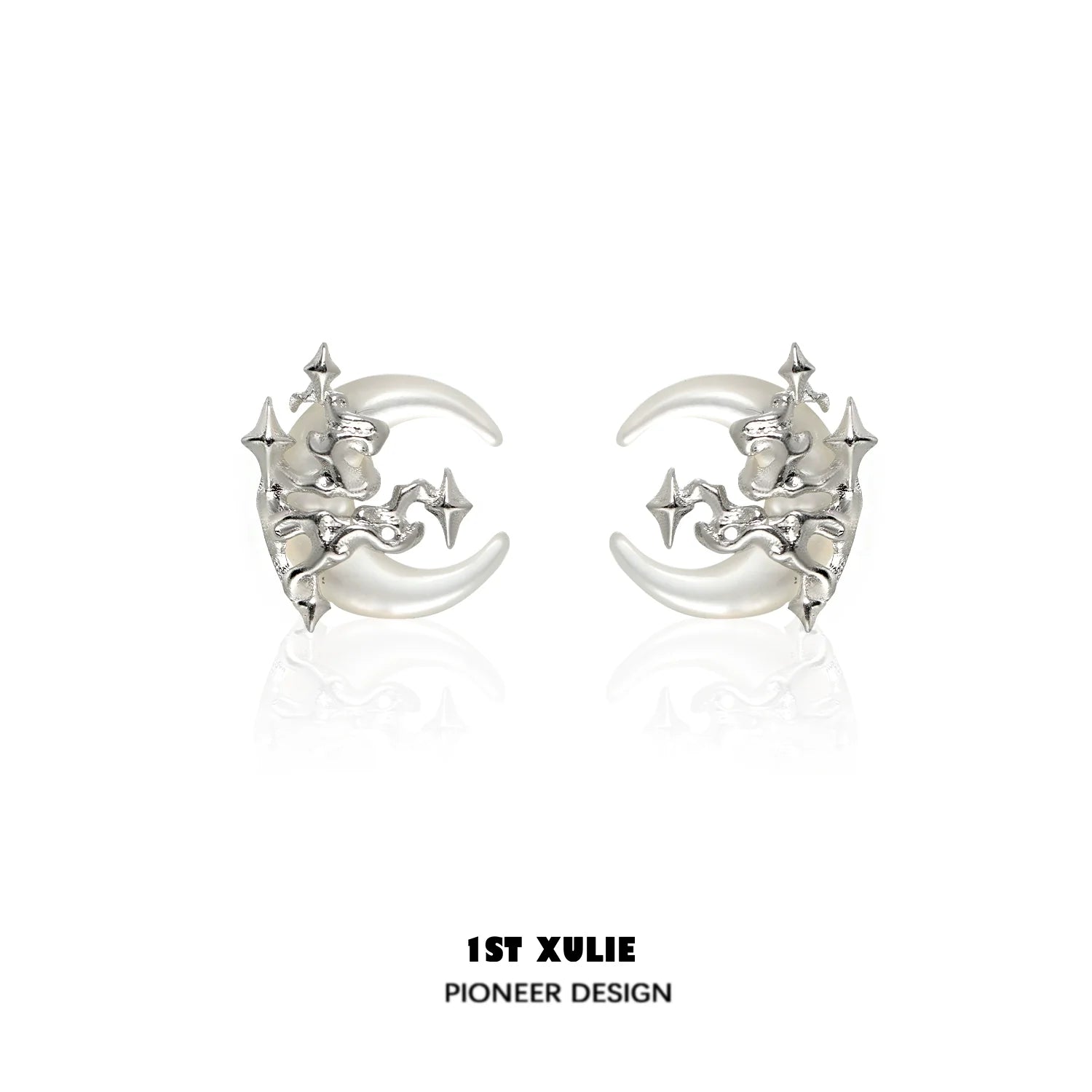 Silver gothic moon earrings featuring a unique celestial design with intricate star details