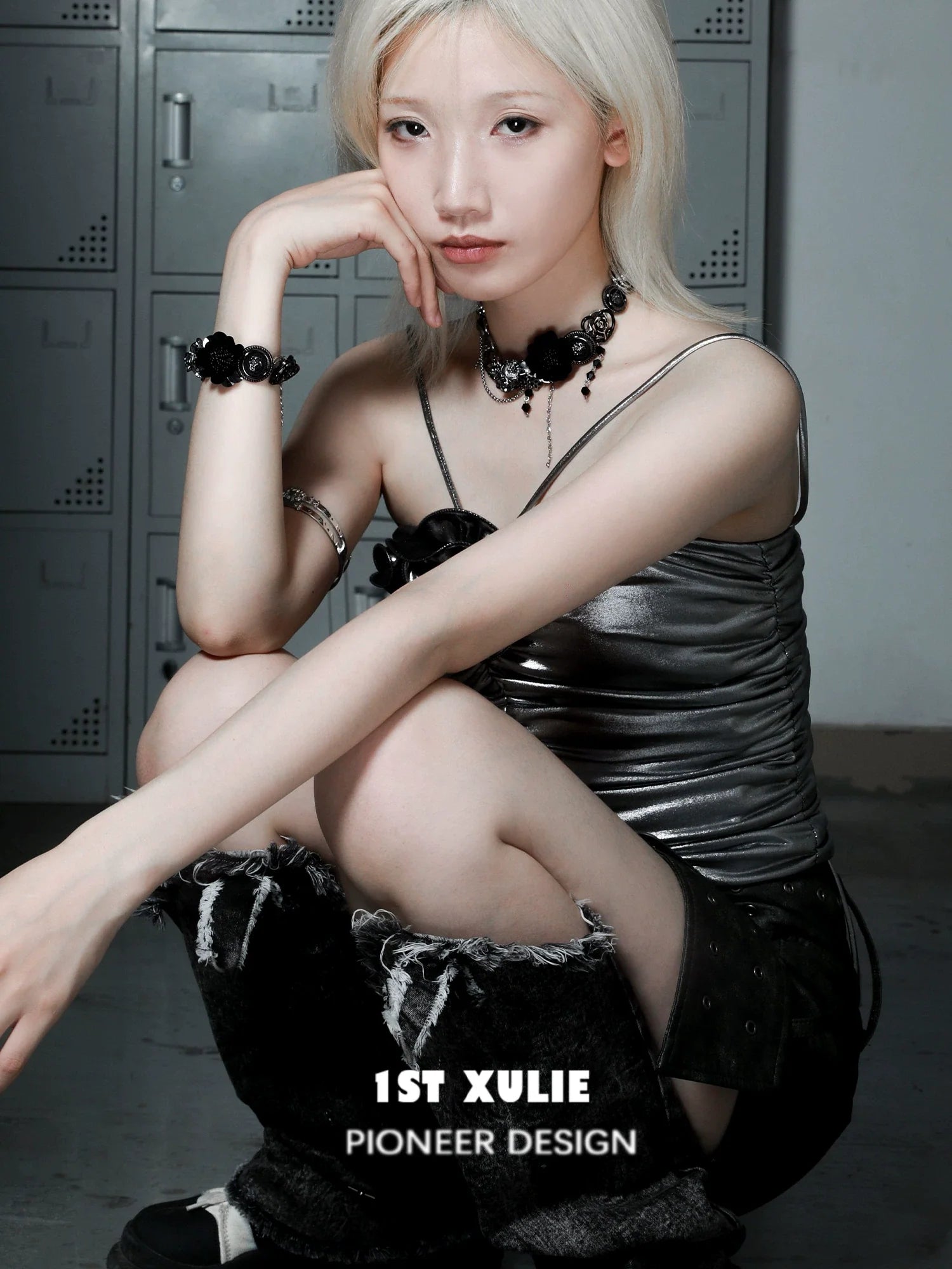 Gothic rose clavicle necklace worn by model with silver top and edgy fashion style