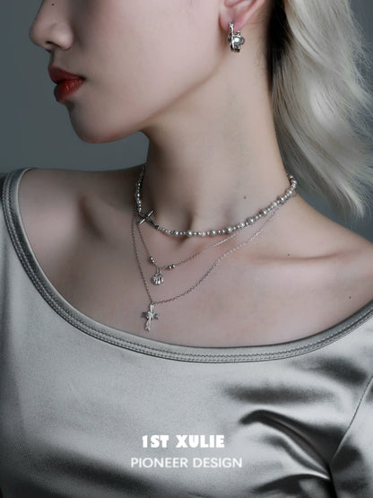 Stylish gray pearl silver double layer necklace worn with trendy outfit for elegant look