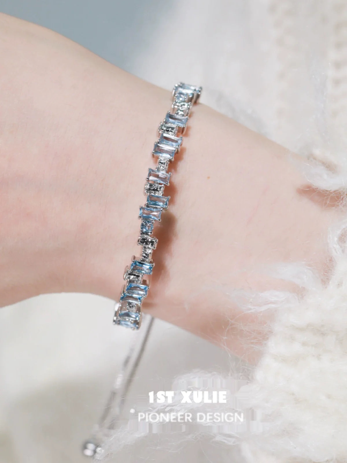 Iceland zircon star bracelet featuring sparkling blue stones on a delicate silver chain