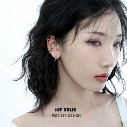 Stylish model wearing Icelandic snowfall earrings that add elegance to any outfit