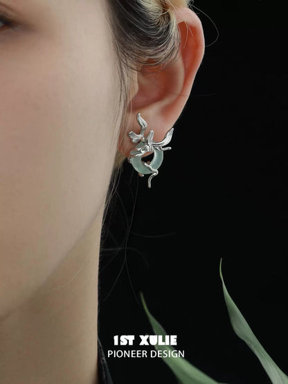 Iris silver stud earrings with a unique design featuring elegant silver detailing