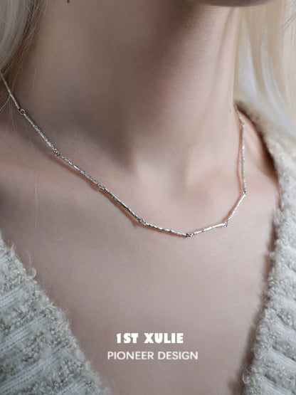 Elegant minimalist bamboo necklace by 1STXULIE, featuring a simple design for everyday wear