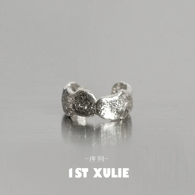Minimalist frosted ear cuffs in silver with a unique textured design for stylish ear accessories