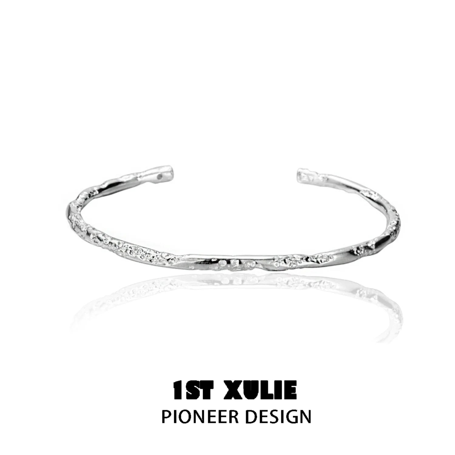 Sleek minimalist silver bracelet by 1STXULIE with a textured design for everyday elegance