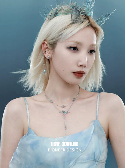 Elegant moon double necklace by 1ST XULIE showcased on a model with a light blue dress and matching accessories.