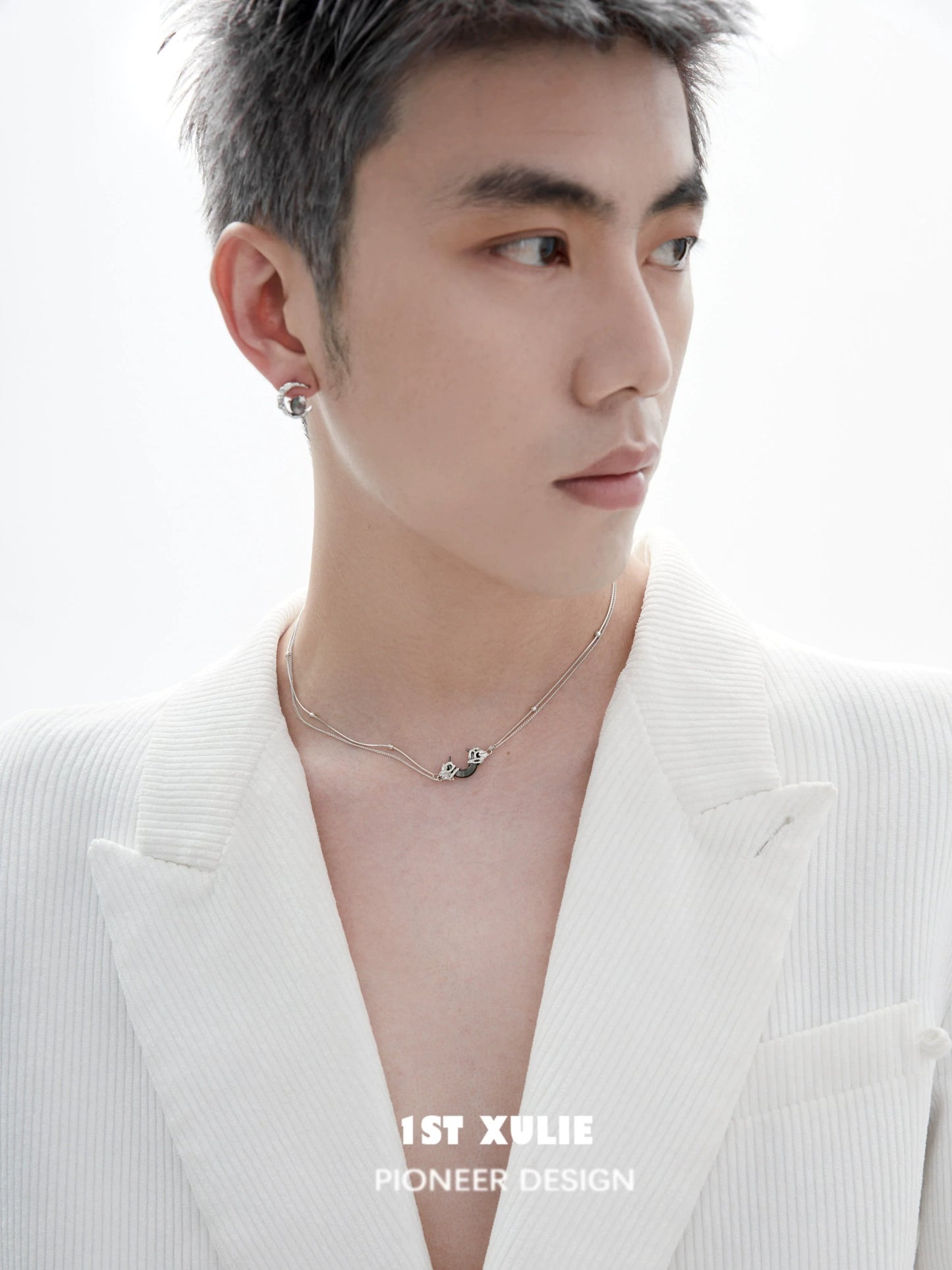 Stylish moonlight couple necklace showcased on a model in a white blazer, perfect for couples