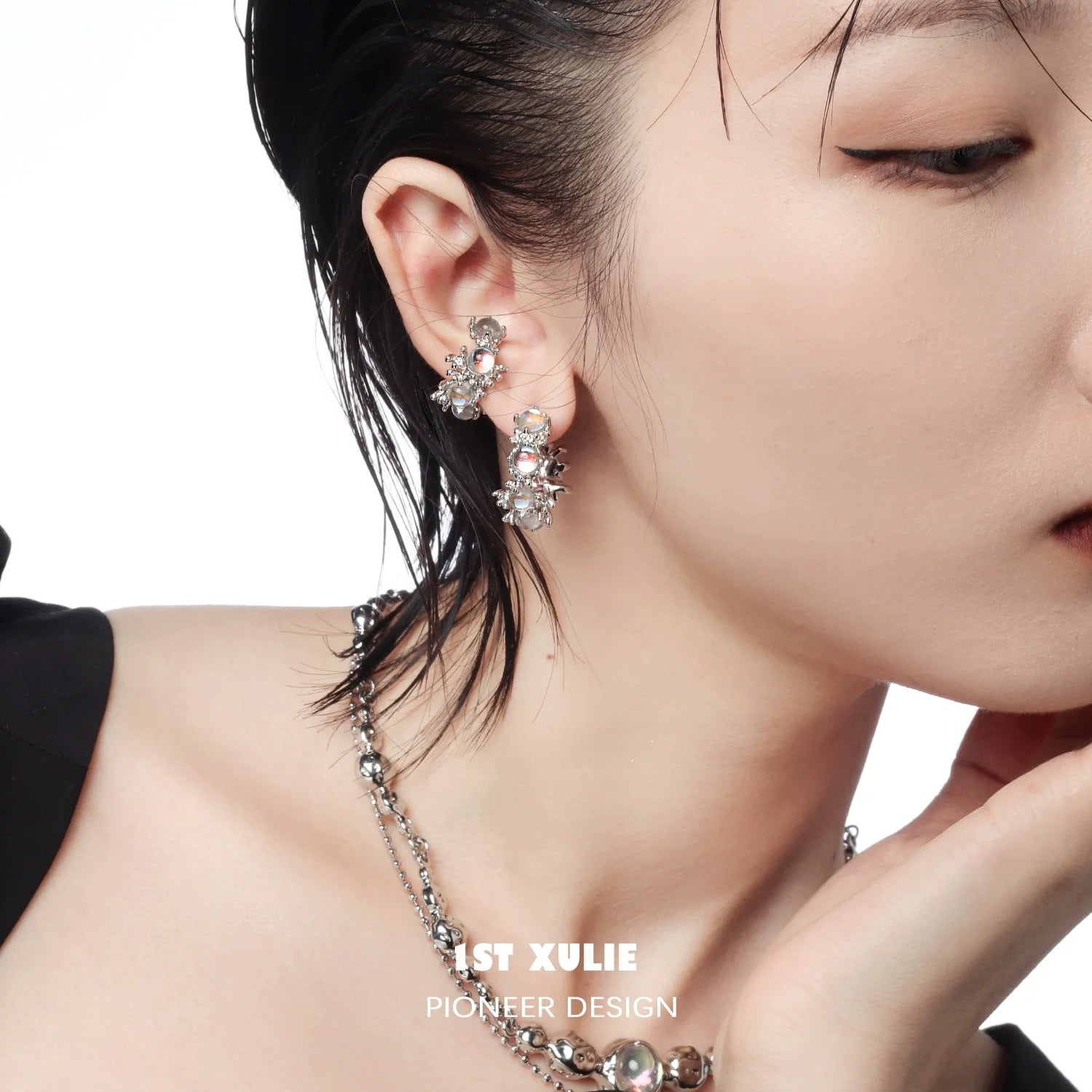 Elegant moonstone hoop earrings featured on a model showcasing their unique design