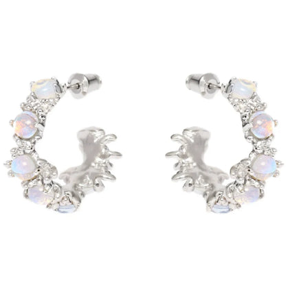 Elegant silver moonstone hoop earrings adorned with shimmering stones for a stylish look