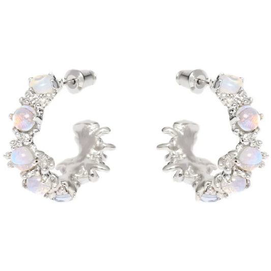 Elegant silver moonstone hoop earrings adorned with shimmering stones for a stylish look