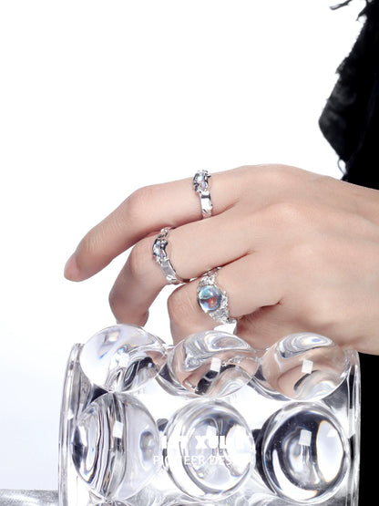 Elegant moonstone silver ring displayed on a hand, showcasing its unique gemstone design and shine