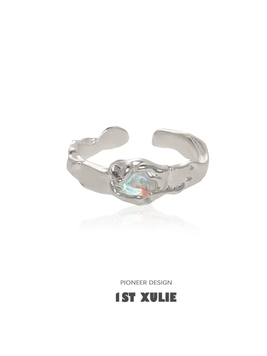 Elegant moonstone silver ring featuring a unique design with a shimmering stone