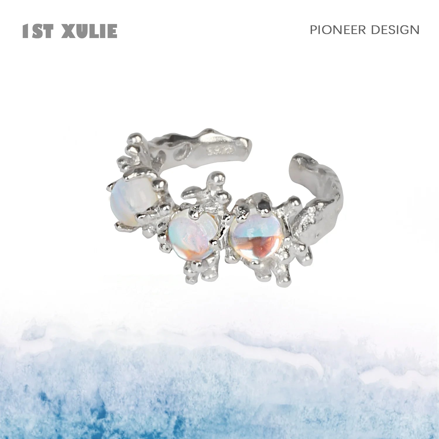 Elegant moonstone silver ring featuring three beautiful gemstones with a unique design