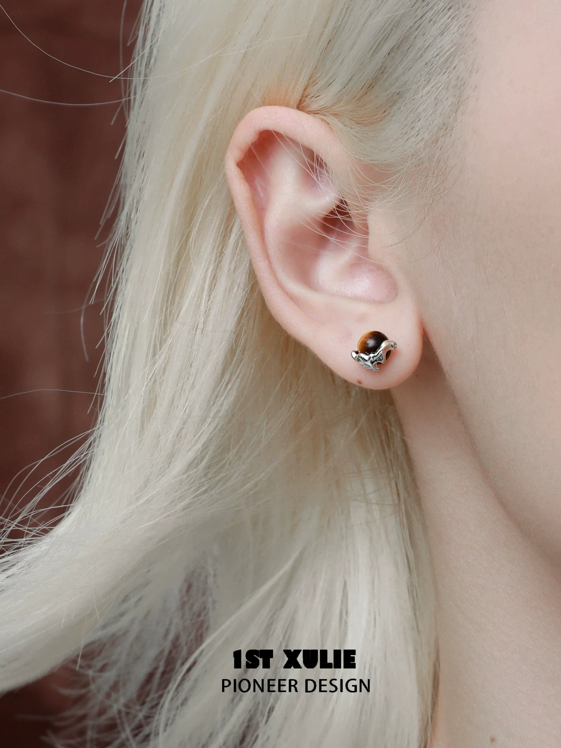 Stylish mystic eye earrings in silver, perfect for adding a unique touch to any outfit