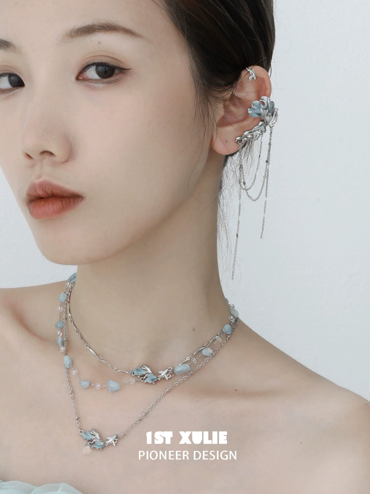 Mystic mermaid tail earrings with intricate detailing, perfect for ocean-inspired jewelry lovers