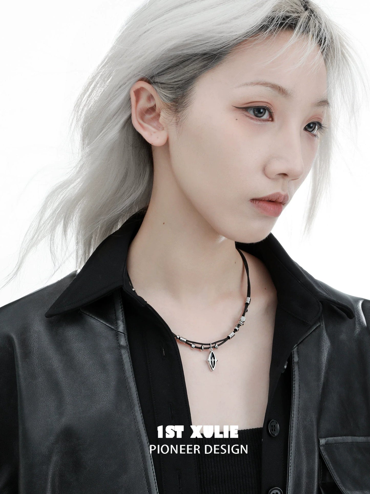 Model wearing a northern star beaded leather necklace with a sleek design and striking details