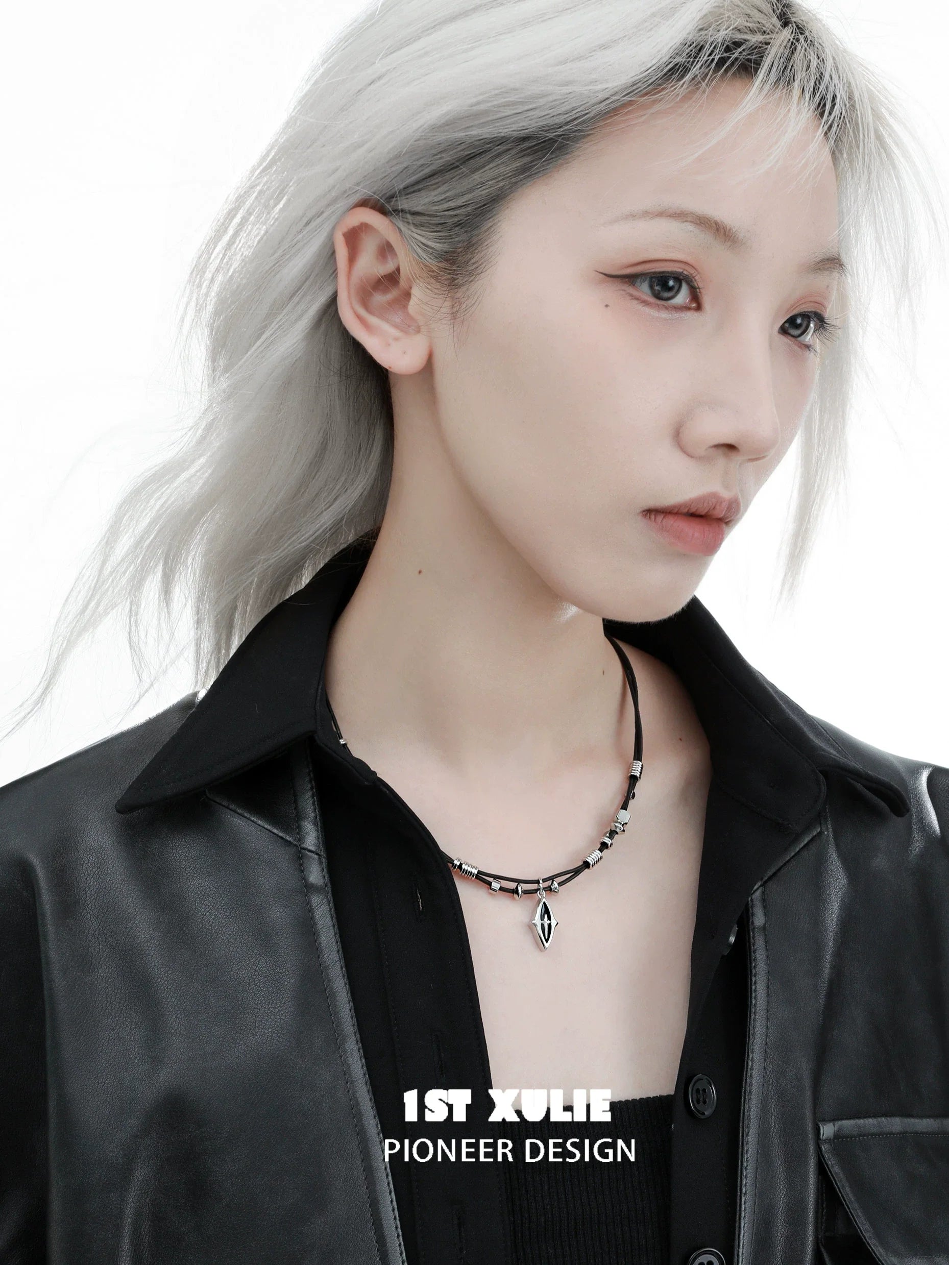 Model wearing a northern star beaded leather necklace with a sleek design and striking details