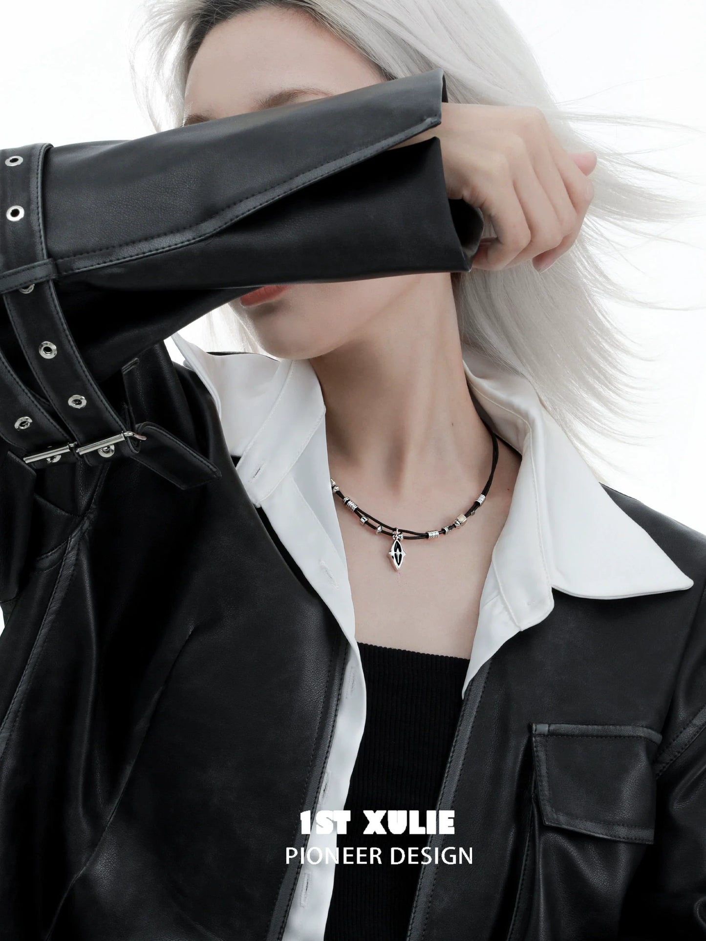 Model wearing a northern star beaded leather necklace paired with a stylish black outfit