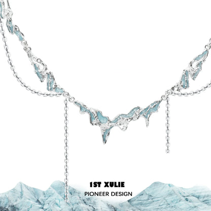Ocean inspired tassel necklace with silver chain and marine-themed design for a beachy look