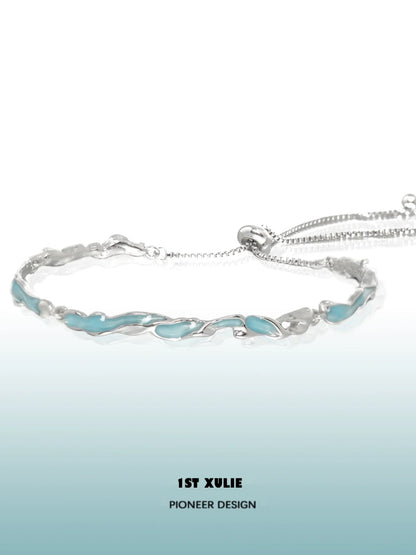 Ocean tide blue bracelet with a sleek design and silver accents for a stylish accessory