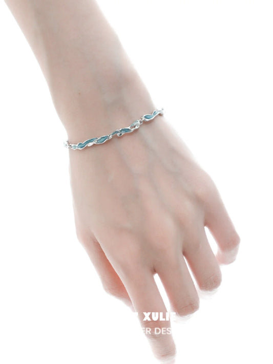 Delicate ocean tide blue bracelet featuring a stylish wave design for a trendy accessory
