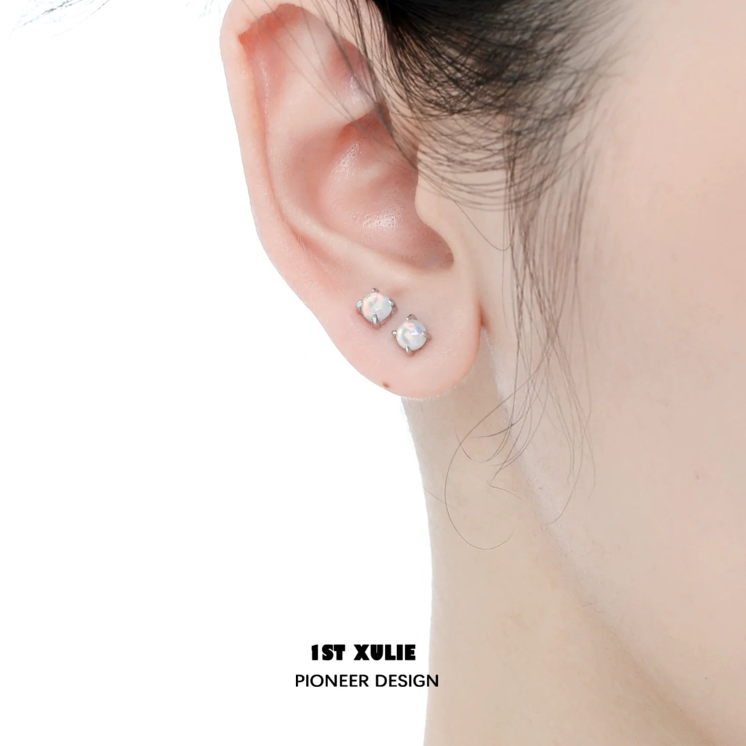 Elegant opal stud earrings in silver setting, perfect for everyday wear and special occasions.