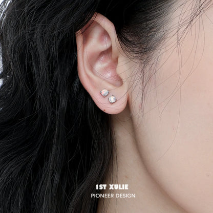 Elegant opal stud earrings with a shine, perfect for any occasion or outfit