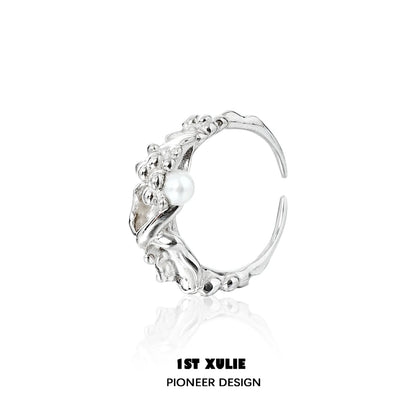 Unique 1STXULIE pearl silver ring featuring intricate detailing and a single pearl accent