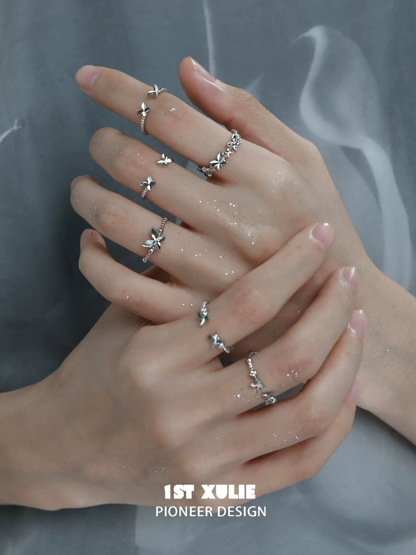 Stylish punk butterfly silver ring displayed on multiple fingers for a unique accessory look