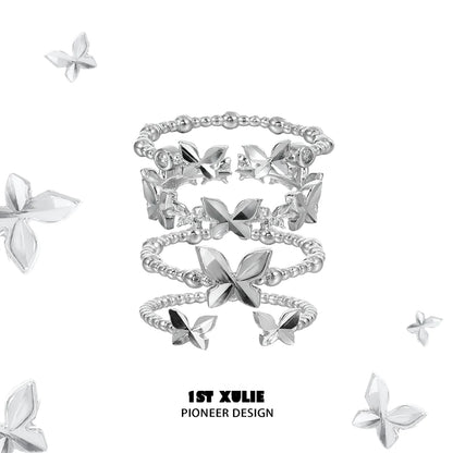 Punk butterfly silver ring stack featuring unique designs and elegant butterfly motifs