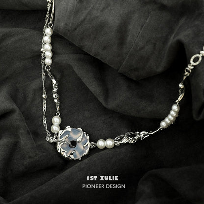 Punk pearl choker necklace with silver accents and unique floral design for stylish outfits
