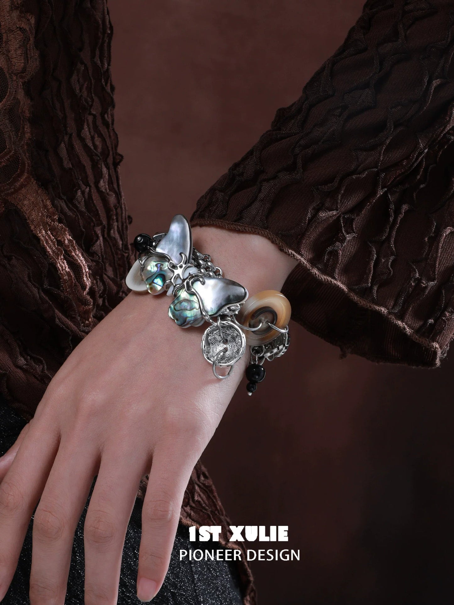 Retro punk butterfly bracelet featuring unique charms and a mix of materials for a stylish accessory