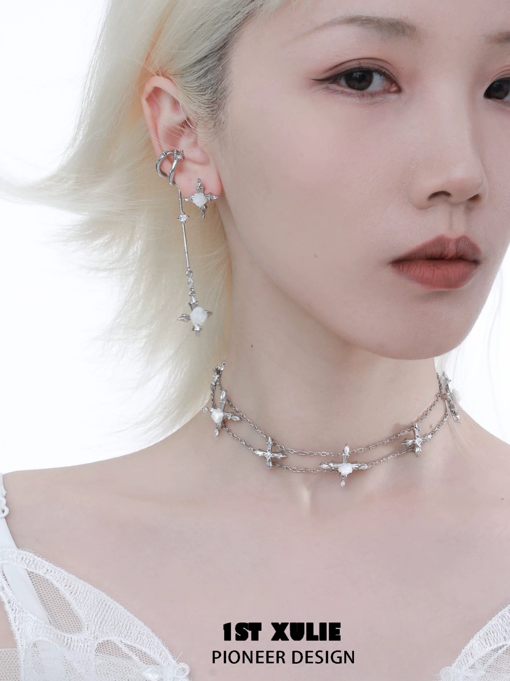 Elegant rose tassel earrings designed by 1ST XULIE featuring a unique star motif