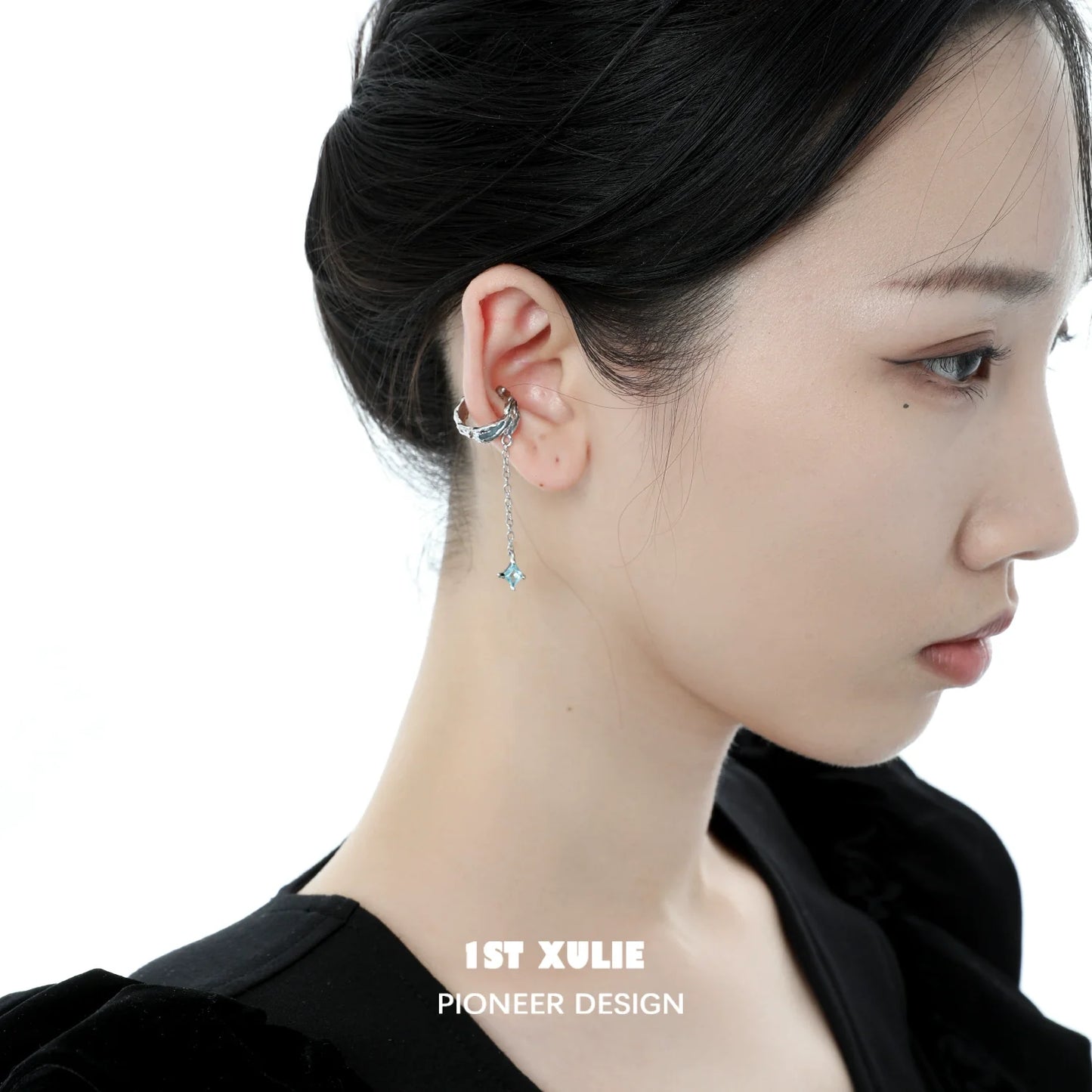 Elegant sea breeze star ear clip design in a woman's ear, showcasing its unique charm